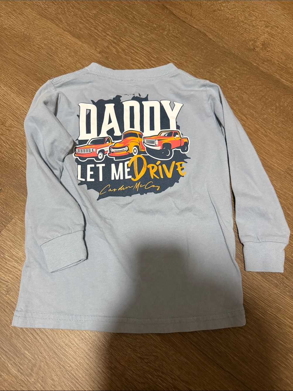 Light Blue Long-Sleeve Kids Tee with 'Daddy Let Me Drive' Car Graphic